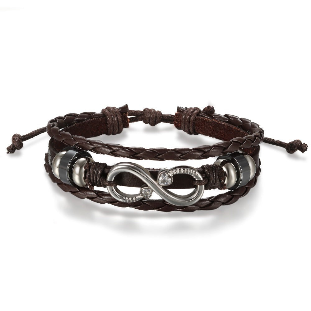 Pulsera de Cuero PU Trenzado con Símbolo Infinito para Hombres y Mujeres - Brazalete en Forma Infinity, Estilo y Blanco Regalo Joyería Unisex Para Boda/Aniversario/Accesorio Punk (Sin Metal, Uso Todo el Año)