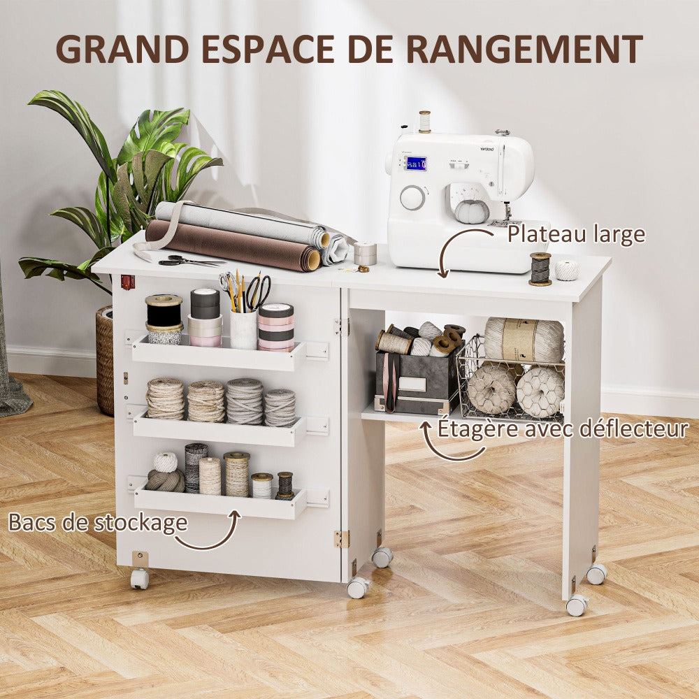 Mesa de costura plegable HOMCOM con tablón abatible, contenedores de almacenamiento, estante abierto y ruedas, gabinete para máquina de coser para sala de estar, oficina, estudio, dimensiones 118 x 40 x 79.5 cm, blanca