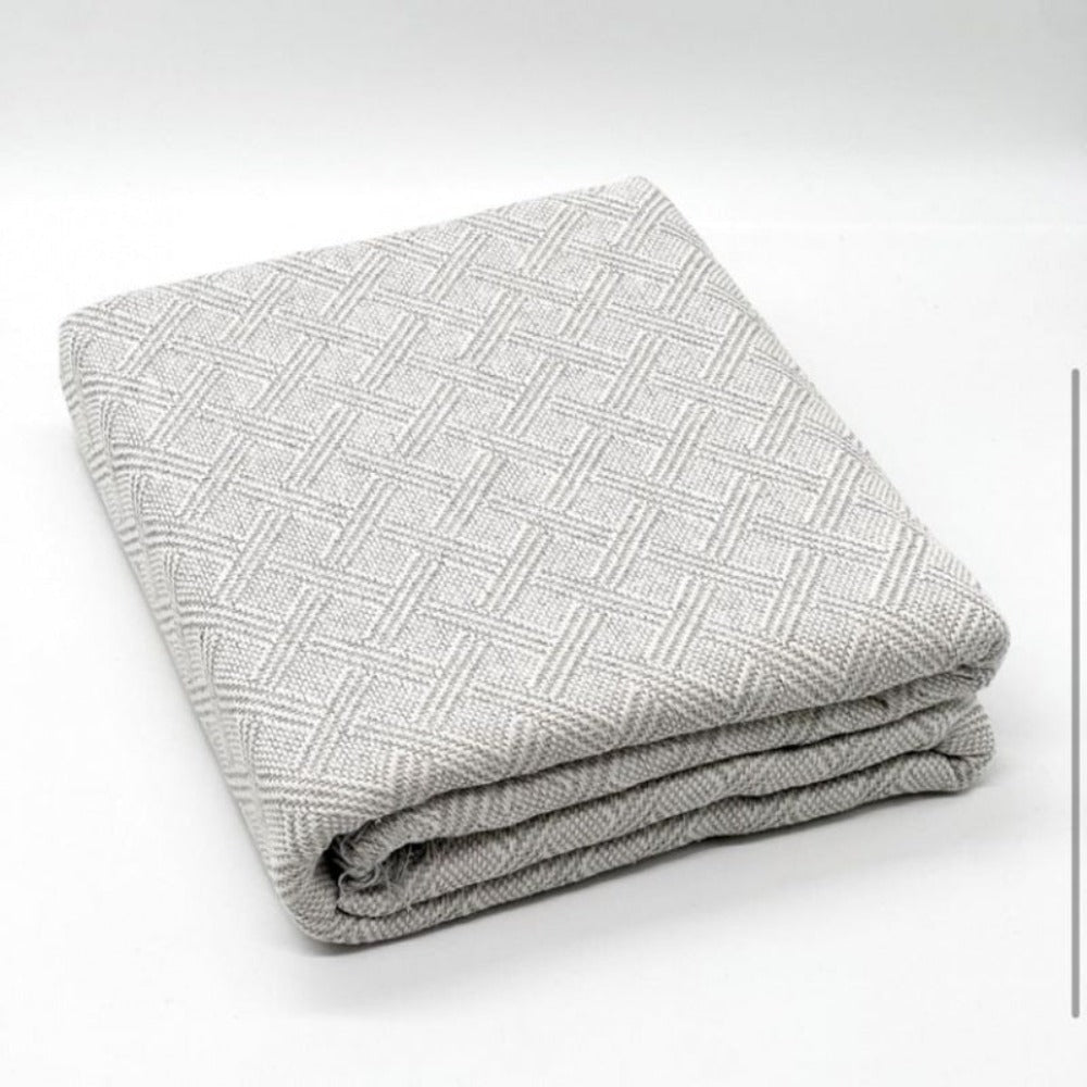 Fular multiusos con tejido Jacquard, resistente y fácil de limpiar, disponible en varios colores y tamaños, ideal para sofá, cama o picnic.