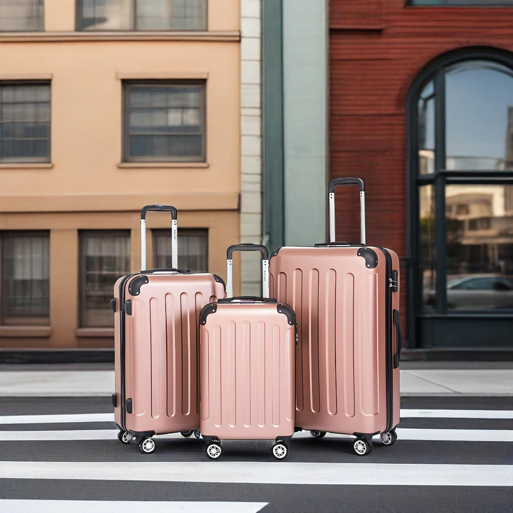 Un conjunto de tres maletas, incluyendo una maleta de mano de 20 pulgadas para viajes, con cerradura de contraseña y ruedas giratorias de 360 grados, que consta de tamaños mediano, grande y extra-grande