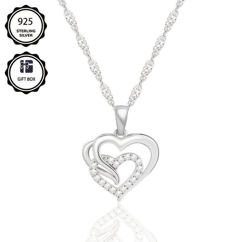 Un elegante collar colgante en plata 925 para mujeres, con una cadena de onda única y un colgante de corazón de circonita sintética brillante, ideal como regalo de vacaciones o para mujeres, incluye caja de regalo