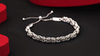 Mejora tu estilo con esta pulsera unisex flexible de cuerda retorcida hecha de plata de ley 925, ideal para regalos en San Valentín, Navidad o aniversarios, y que incluye una linda caja de regalo.