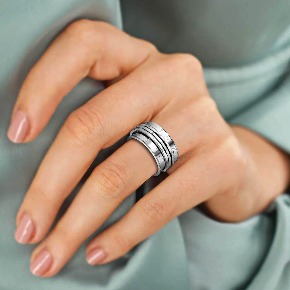 Anillo giratorio tipo fidget spinner retro JewelryWe para mujer con patrón de luna y estrellas, bandas de anillo giratorias de acero inoxidable