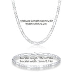 Elegante y versátil set de collar y pulsera Fegaro de plata 925, apto tanto para hombres como para mujeres, con baja alergenicidad. Perfecto para uso casual, hip-hop, punk, deportes, fiestas y regalos navideños. Viene en una exquisita caja de regalo.