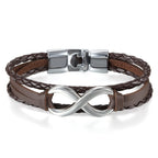 Pulsera de Cuero PU Trenzado con Símbolo Infinito para Hombres y Mujeres - Brazalete en Forma Infinity, Estilo y Blanco Regalo Joyería Unisex Para Boda/Aniversario/Accesorio Punk (Sin Metal, Uso Todo el Año)