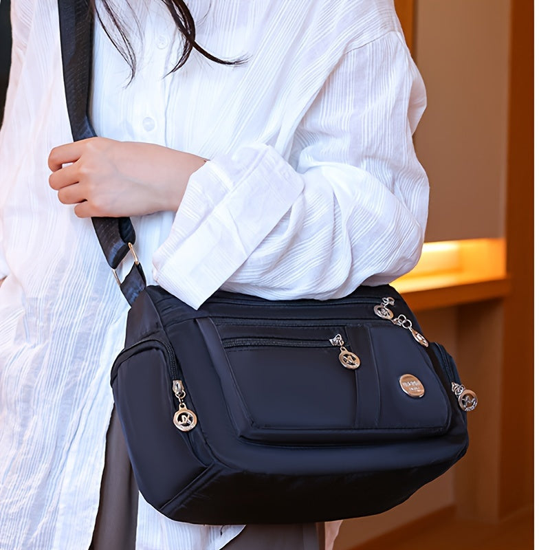 Lingzhikang Bolso Bandolera Unisex Casual - un Bolso de Hombro Espacioso con Múltiples Bolsillos y Correas Ajustables, Hecho de Forro Ligero y Duradero. La Versión Negra Presenta Detalles de Borlas