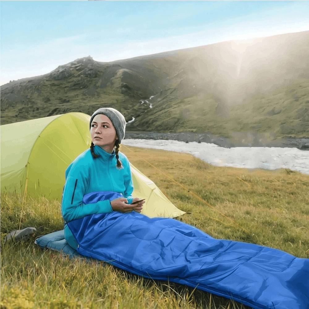 Saco de dormir turístico con capucha 210x75 cm, bivouac ligero. Saco de dormir de camping impermeable para verano y estaciones de transición. Relleno sintético hipoalergénico. Saco de dormir momia compacto para mochileros. Cremallera segura. Cordón en la