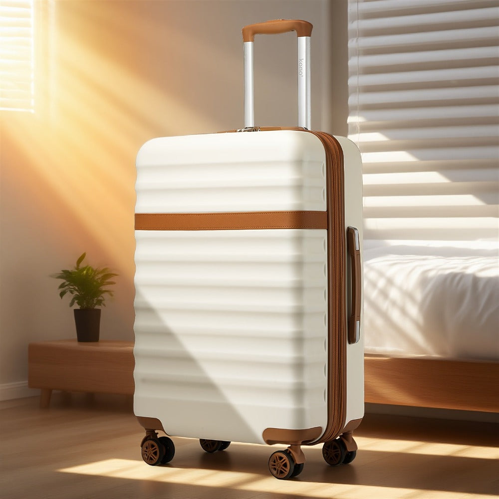 Maleta KONO Disponible en Tamaños de 20 Pulgadas, 24 Pulgadas y 28 Pulgadas, Fabricada con una Mezcla de ABS y Policarbonato. Este Trolley de Carro Rígido Está Equipado con Cuatro Ruedas y un Cerradura TSA, lo que lo Hace Ideal para Uso en la Cabina y Via