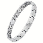 Una elegante y sofisticada pulsera magnética para mujer hecha de titanio, con un imán de 3500 Gauss, tamaño ajustable, y viene con una caja de embalaje y herramienta de ajuste.