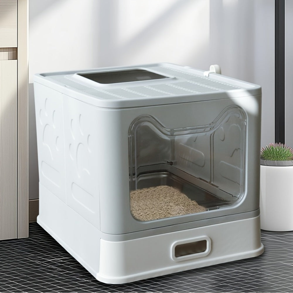 Arenero para gatos de acero inoxidable con entrada frontal y salida superior, diseñado para facilitar la limpieza, ideal para gatos y otras mascotas