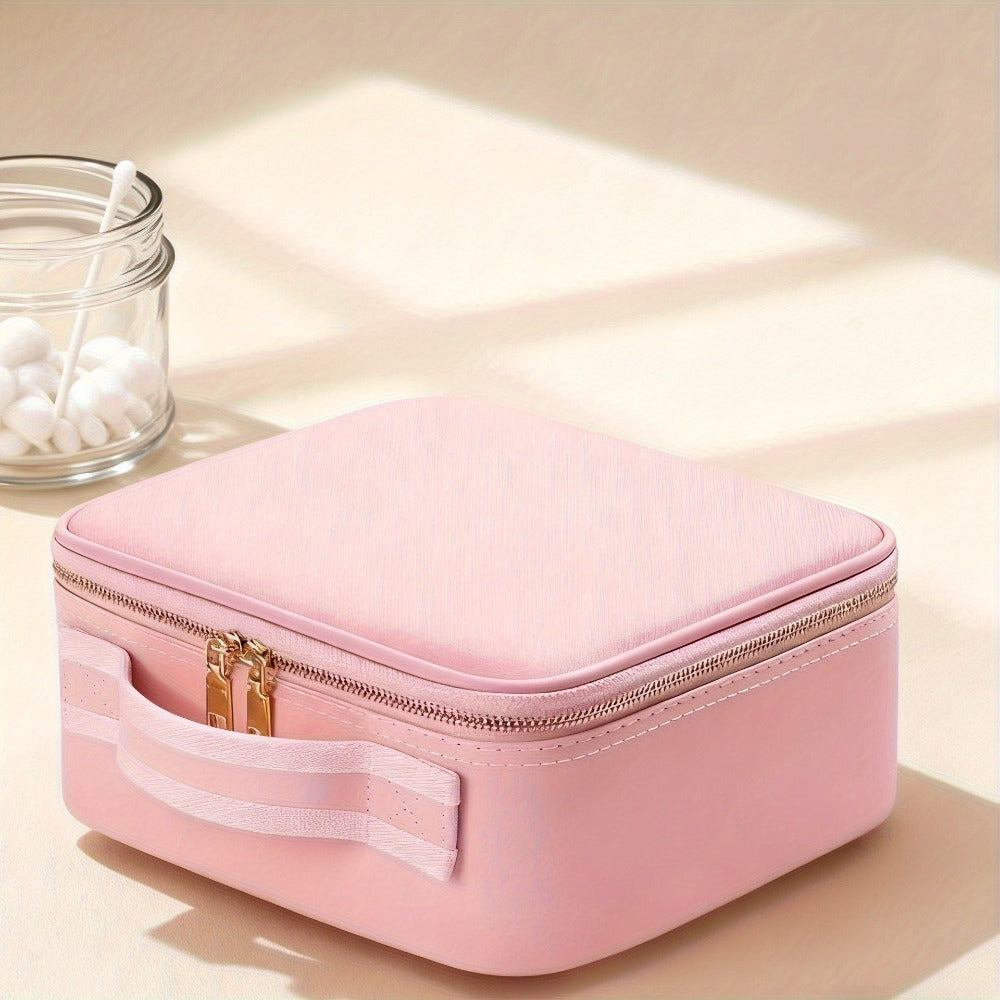 Esta extra grande bolsa de maquillaje viene en rosa y negro, con espejo y ofreciendo amplio espacio para cosméticos. Su diseño elegante la hace ideal tanto para maquilladores profesionales como para uso personal.