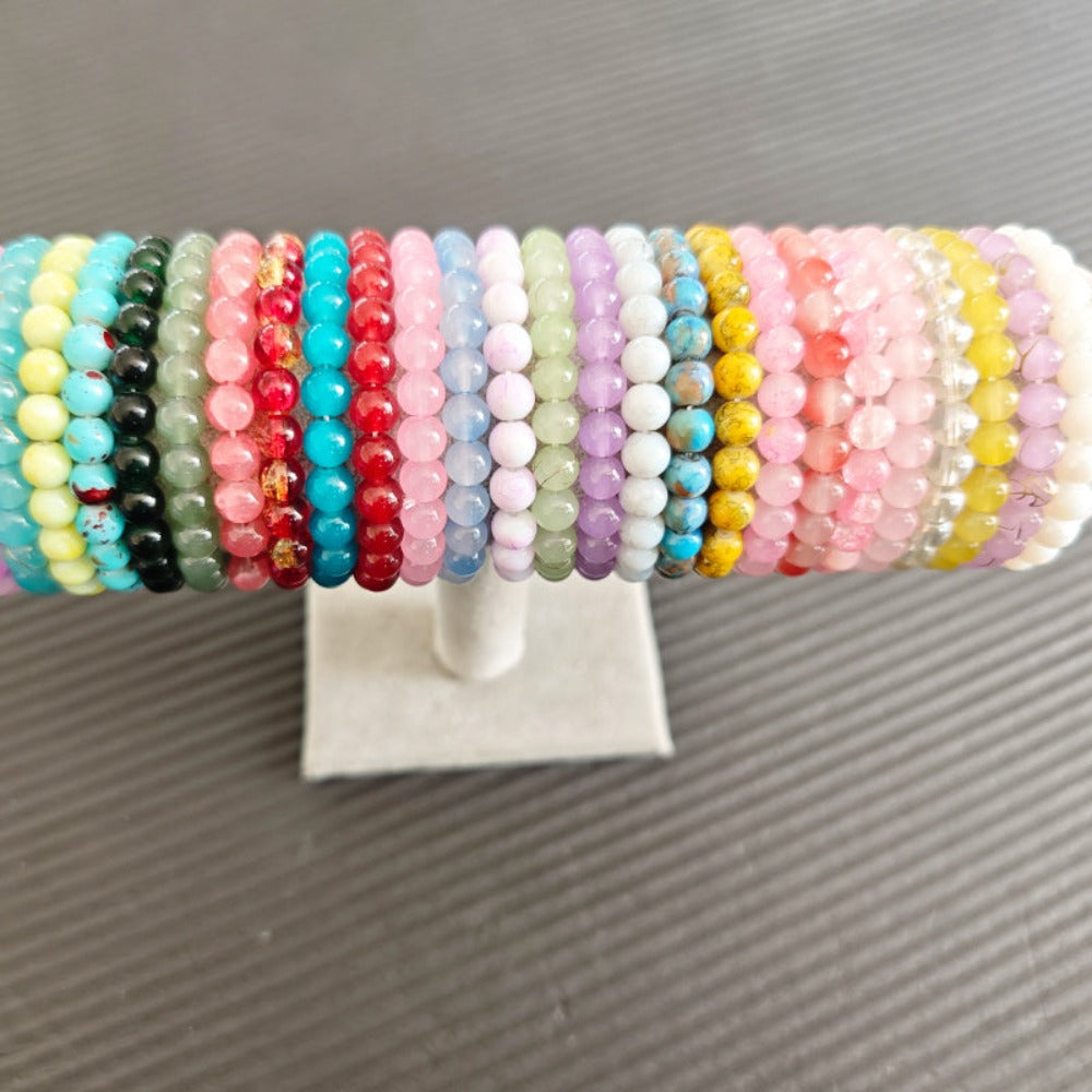 Juego de 100 pulseras elásticas unisex de imitación de piedra natural y cristal, colores surtidos, decoración con diseño de cuentas hecho a mano