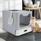 Arenero para gatos de acero inoxidable con entrada frontal y salida superior, diseñado para facilitar la limpieza, ideal para gatos y otras mascotas