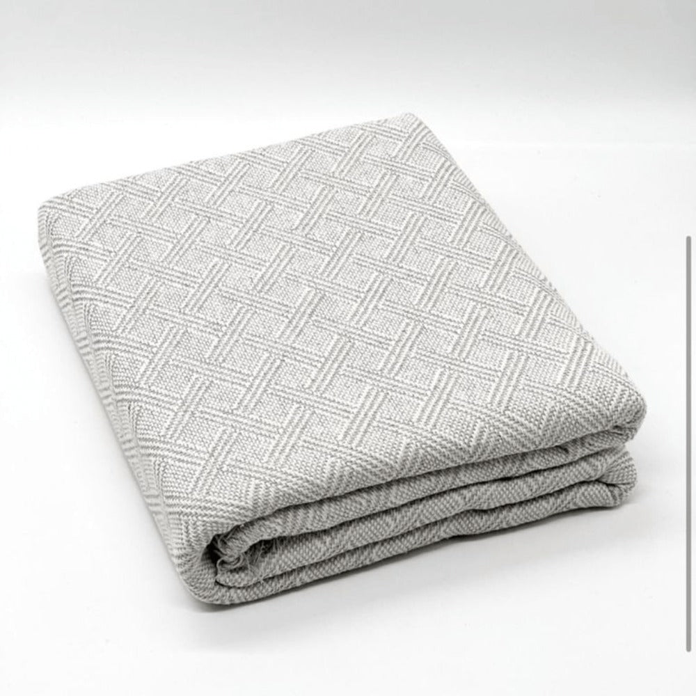 Fular multiusos con tejido Jacquard, resistente y fácil de limpiar, disponible en varios colores y tamaños, ideal para sofá, cama o picnic.