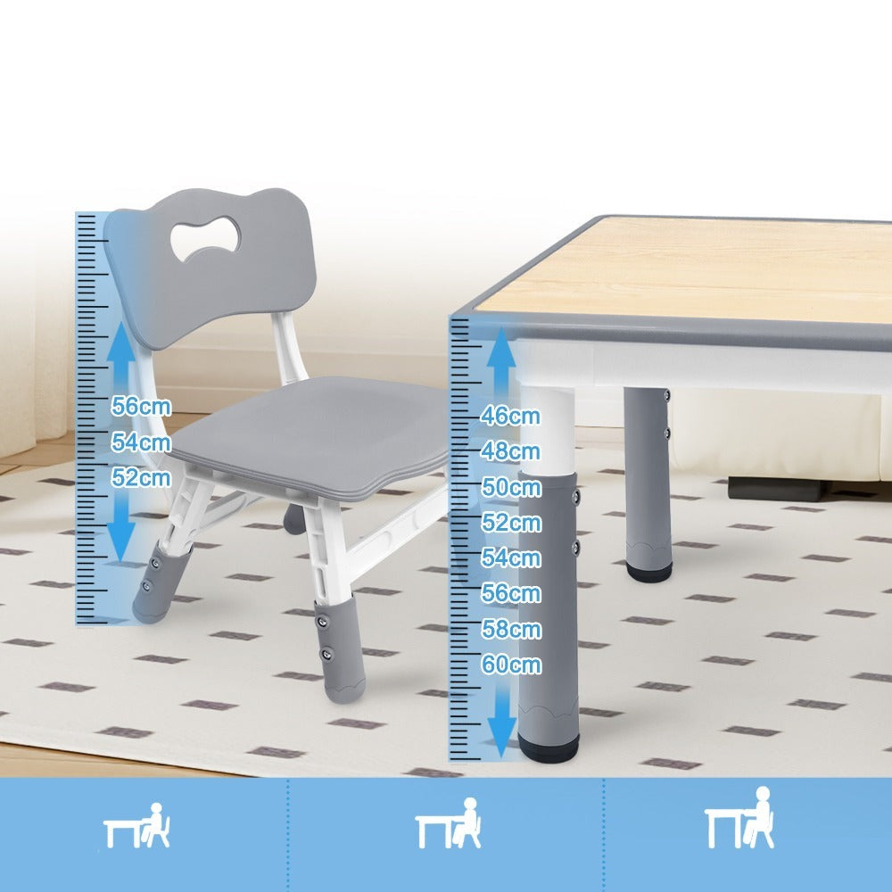 Una mesa acompañada de cuatro sillas, con un diseño de altura ajustable, ideal para una oficina y una mesa de aula que es fácil de limpiar.