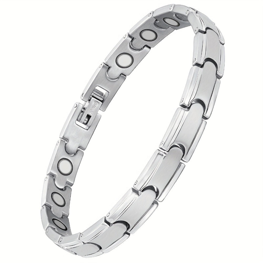 Una elegante y sofisticada pulsera magnética para mujer hecha de titanio, con un imán de 3500 Gauss, tamaño ajustable, y viene con una caja de embalaje y herramienta de ajuste.