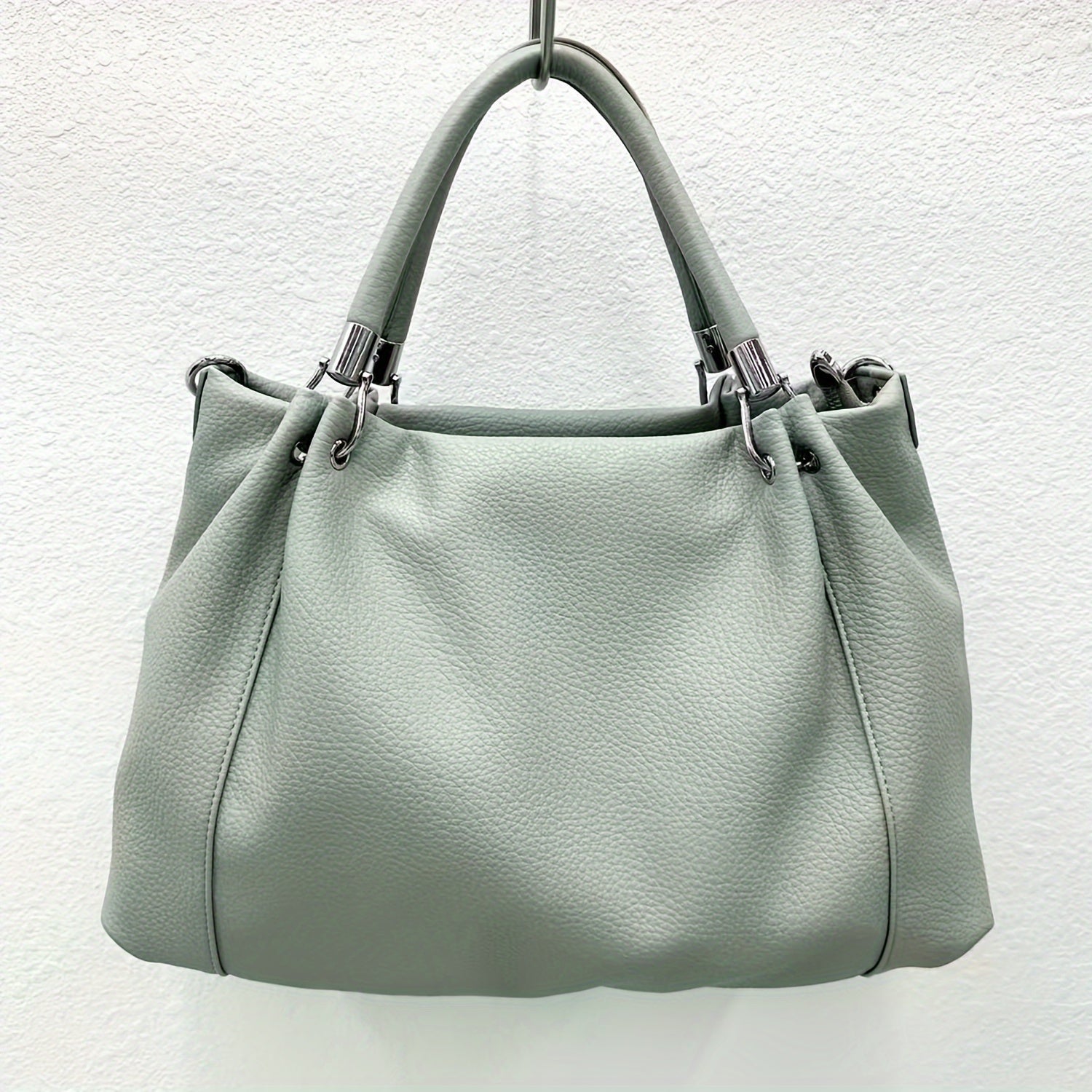 Bolso de mano desmontable para mujer con correas de hombro ajustables. Es un bolso cruzado de gran capacidad y con múltiples compartimentos de almacenamiento. Es adecuado como regalo para festivales y está disponible en varios colores