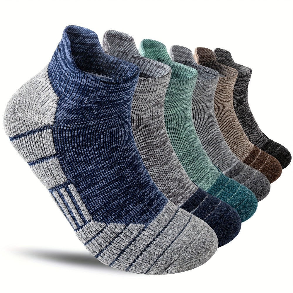 Seis pares de calcetines tobilleros de lana merino, ideales para senderismo y running. Estos calcetines de trabajo ofrecen soporte de compresión, absorben el sudor y son transpirables con un amortiguamiento grueso. Son de corte bajo y están diseñados para