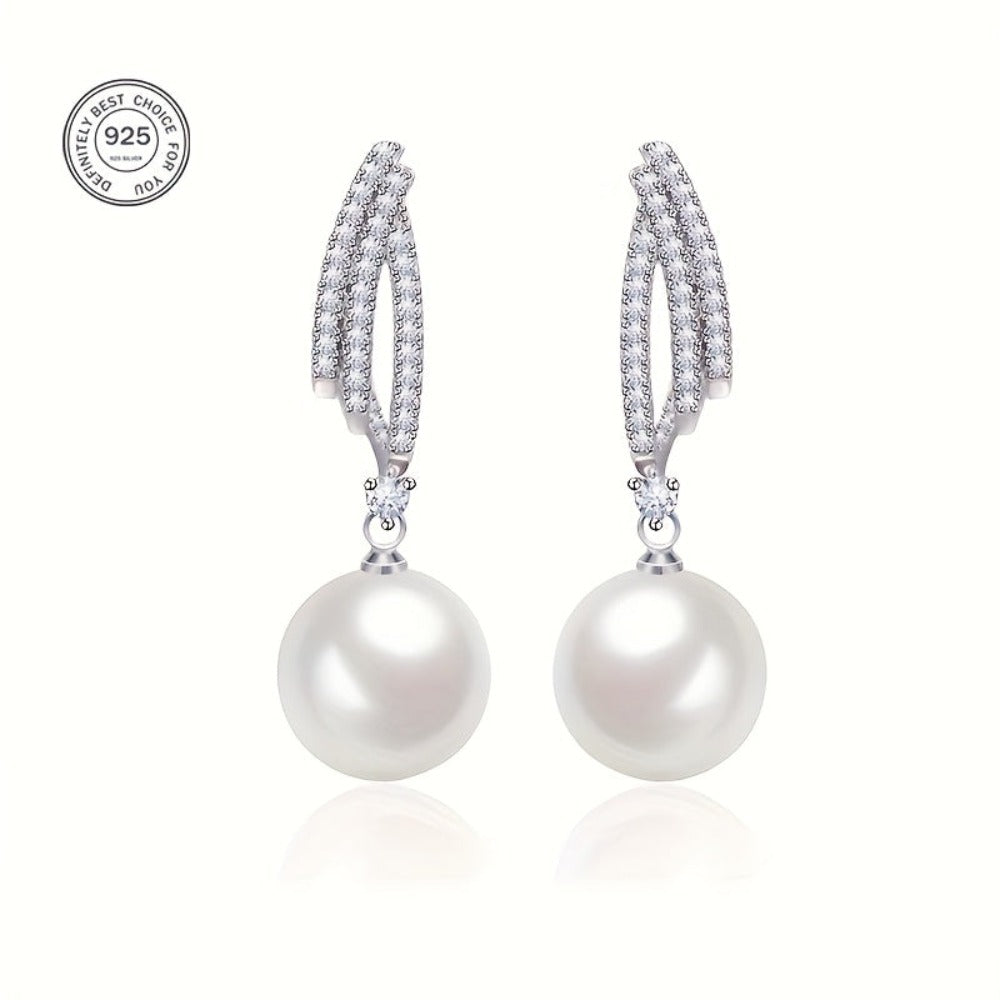 Pendientes de perlas elegantes y lujosos hechos de plata de ley 925, vienen con una caja de regalo de alta calidad.