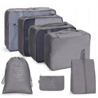 Un set de almacenamiento de viaje de gran capacidad, 7 piezas, bolsa para ropa, vaso de embalaje y bolsas de almacenamiento de nailon, adecuado para ropa, pantalones, zapatos, calcetines - una bolsa ligera estilo vacaciones, un regalo ideal para viajeros.