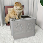 Arenero para gatos de acero inoxidable con entrada frontal y salida superior, diseñado para facilitar la limpieza, ideal para gatos y otras mascotas