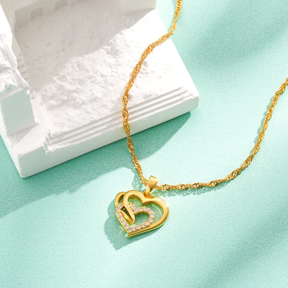 Un elegante collar colgante en plata 925 para mujeres, con una cadena de onda única y un colgante de corazón de circonita sintética brillante, ideal como regalo de vacaciones o para mujeres, incluye caja de regalo