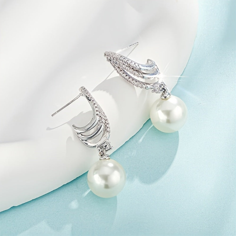 Pendientes de perlas elegantes y lujosos hechos de plata de ley 925, vienen con una caja de regalo de alta calidad.