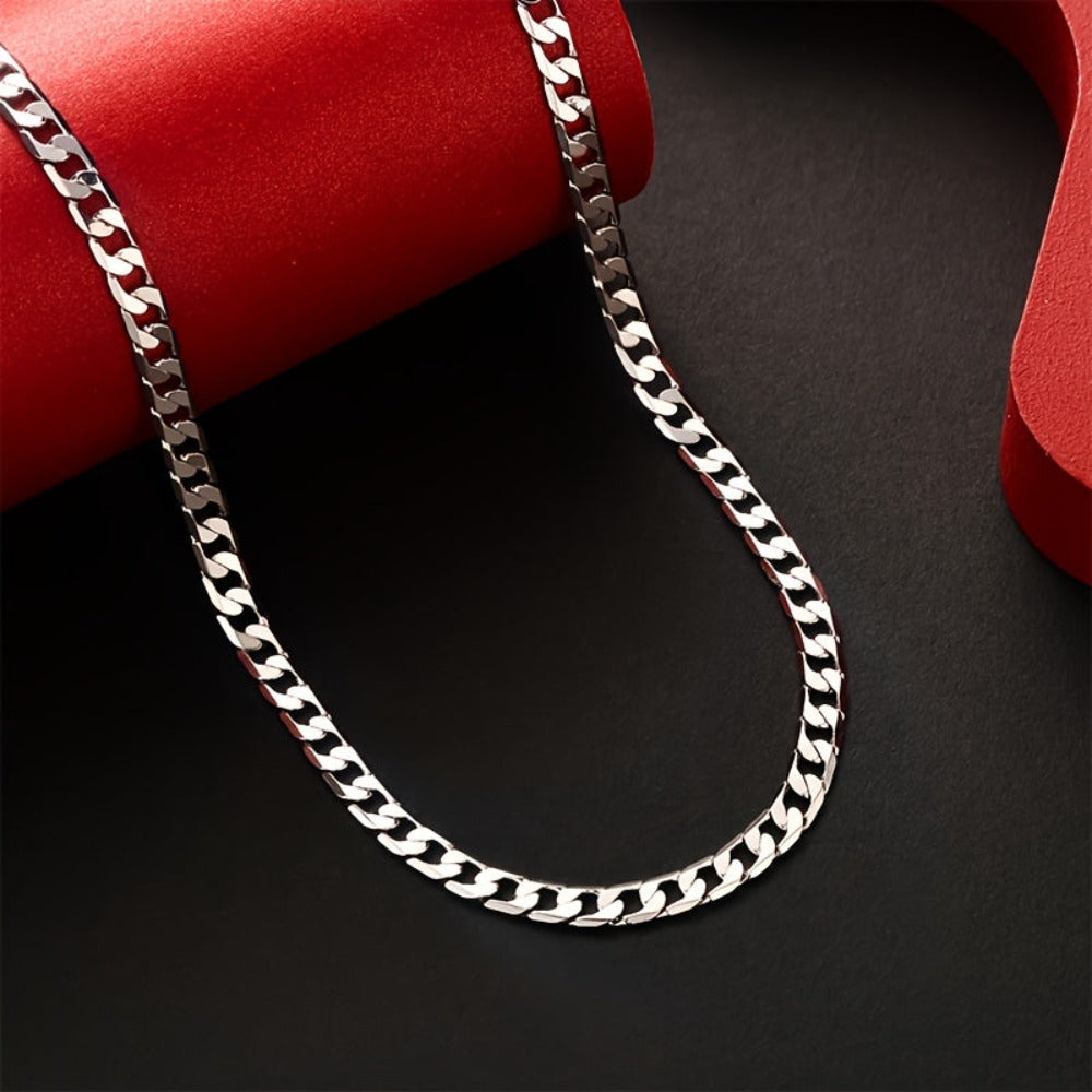 Collar de eslabones cubanos plateado de 925, con un peso de 15.5g/18.5g/20.6g, con un contenido plateado de 10g/12.3g/13.4g. Con un diseño elegante y minimalista, adecuado para uso diario, viene con una caja de regalo prémium.