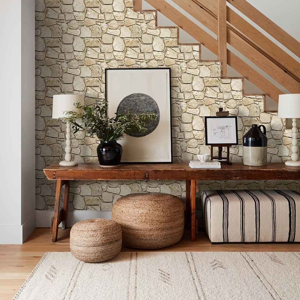 Este paquete incluye diez paneles de pared 3D autoadhesivos con una superficie de PVC tipo piedra, cada uno de 30 por 30 centímetros, diseñados para decorar paredes interiores.