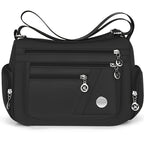 Lingzhikang Bolso Bandolera Unisex Casual - un Bolso de Hombro Espacioso con Múltiples Bolsillos y Correas Ajustables, Hecho de Forro Ligero y Duradero. La Versión Negra Presenta Detalles de Borlas