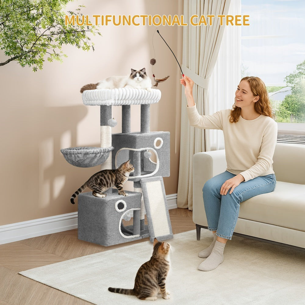 Un árbol para gatos compacto que mide 98 cm, con un diseño amplio y resistente, una gran plataforma suave, una pelota de felpa, una cueva acogedora, un rascador y una tabla rascadora