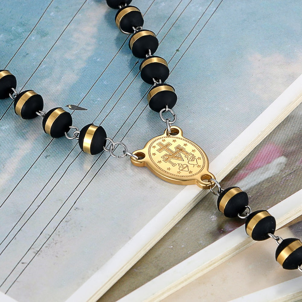 Collar de Rosario de 60 cm para Hombres y Mujeres con Colgante de Crucifijo Dorado de la Virgen María y Jesucristo - Cuentas Negras de Oración Religiosa, Cadena de Bolas para la Fe Católica, Uso Diario y Regalos de Navidad (Unisex)