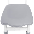 Una mesa acompañada de cuatro sillas, con un diseño de altura ajustable, ideal para una oficina y una mesa de aula que es fácil de limpiar.