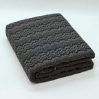 Fular multiusos con tejido Jacquard, resistente y fácil de limpiar, disponible en varios colores y tamaños, ideal para sofá, cama o picnic.
