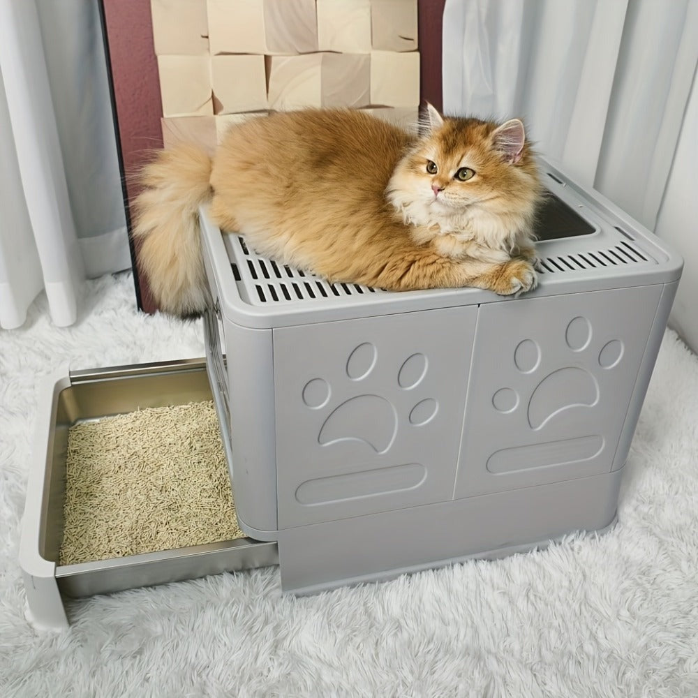 Arenero para gatos de acero inoxidable con entrada frontal y salida superior, diseñado para facilitar la limpieza, ideal para gatos y otras mascotas