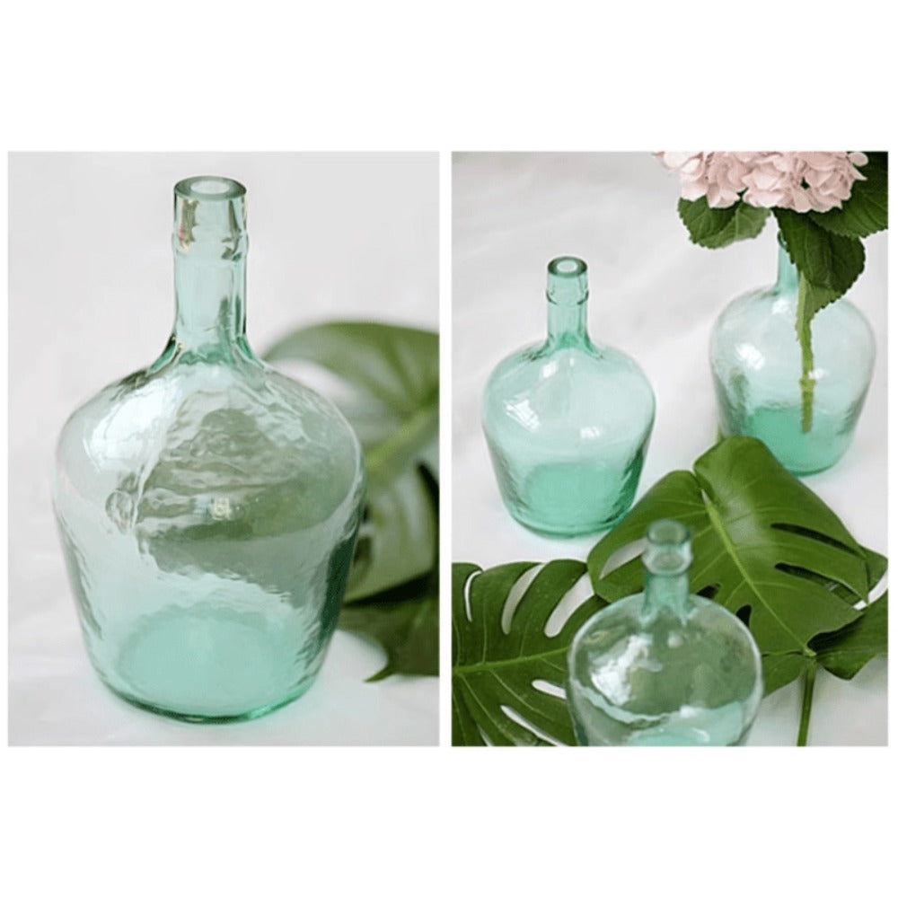 LILI HOME Damajuana Jarrón Garrafa de Vidrio Reciclado – Estilo Mediterráneo Artesanal desde 4L hasta 16L Un objeto atemporal que une diseño, sostenibilidad y calidez. Cada pieza es única, soplada a mano con un acabado que conserva la belleza natural del