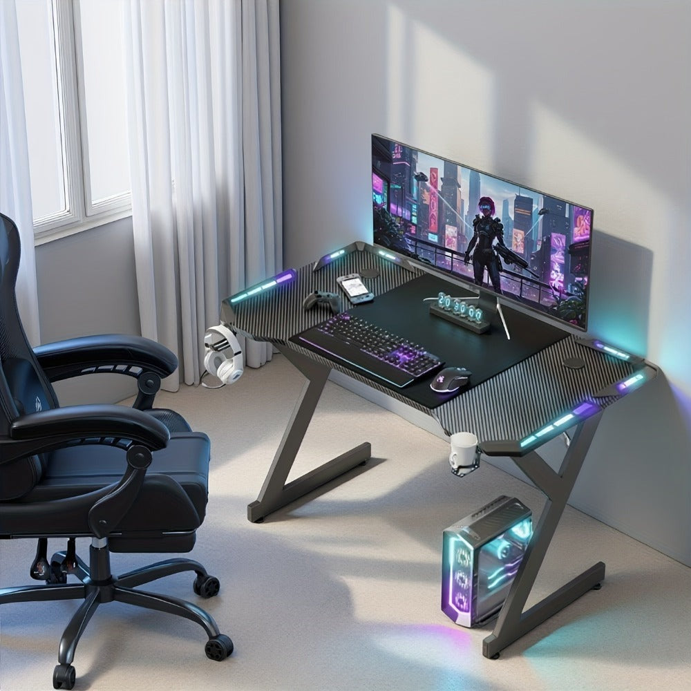 Escritorios de oficina y estaciones de trabajo para computadora con luces LED, escritorio ergonómico para gaming con superficie de fibra de carbono, estación de trabajo robusta para PC para hogar/oficina con gancho para auriculares, portavasos,