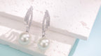 Pendientes de perlas elegantes y lujosos hechos de plata de ley 925, vienen con una caja de regalo de alta calidad.